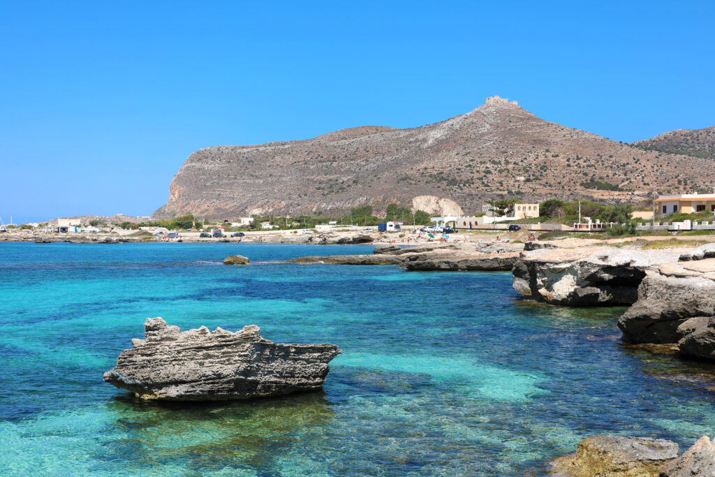 Beautiful panoramic view of rocky beach and blue lagoon of Favignana island, Sicily, Italy